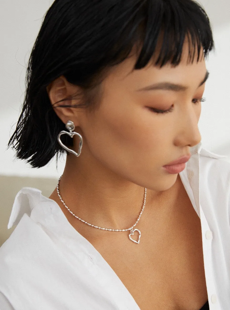 Irregular Heart Pendant Necklace: Artistic Asymmetry