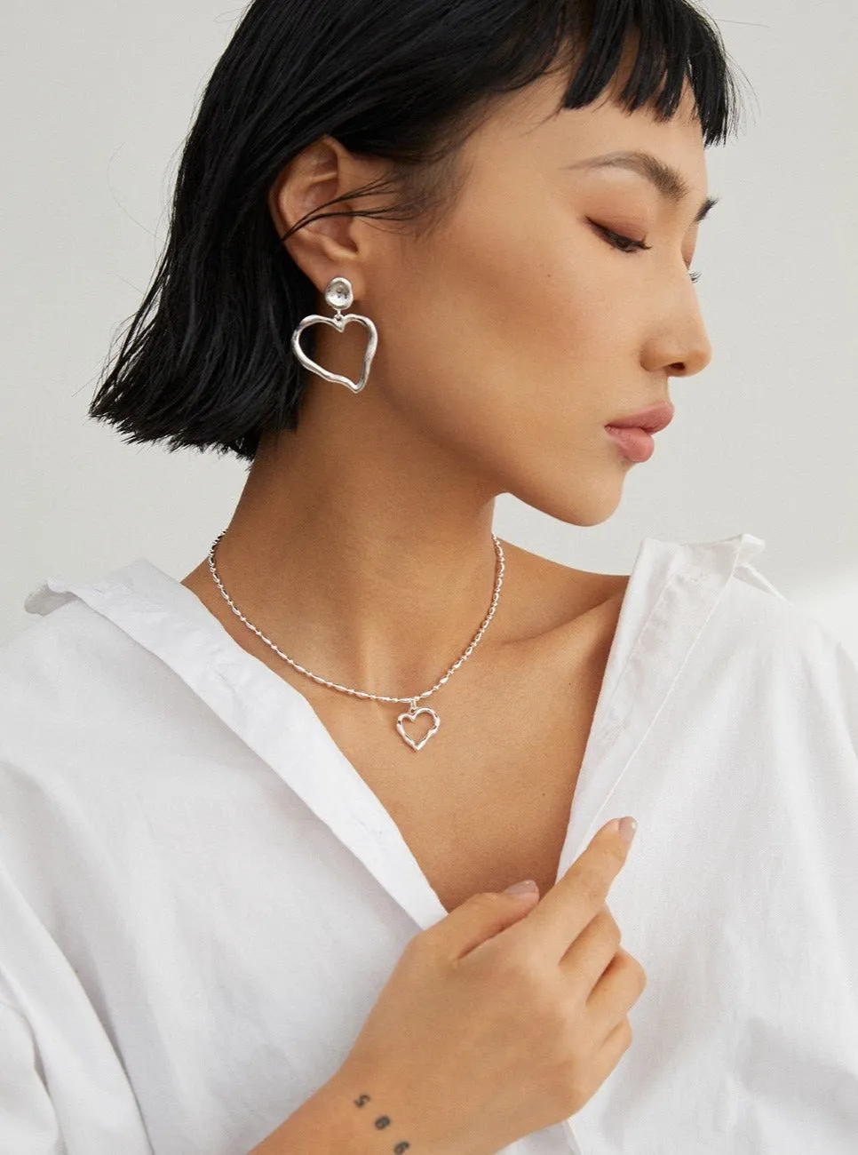Irregular Heart Pendant Necklace: Artistic Asymmetry